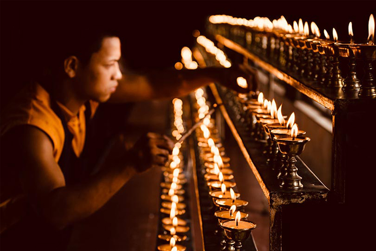 A butter lamp offering at a temple